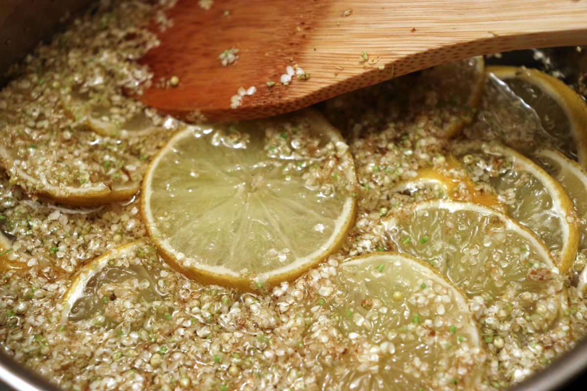 Elderflowers and slices of lemon/limes in the hot thick syrup 