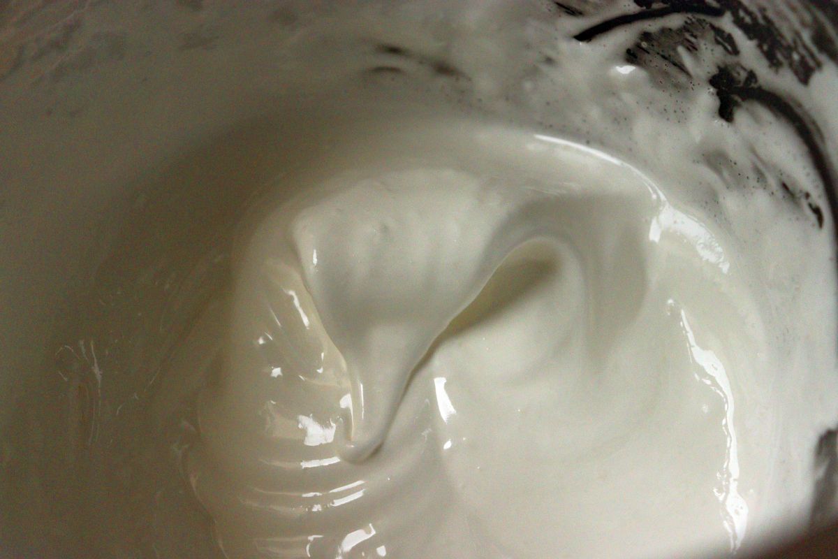 Egg whites beat with sugar for meringue topping 