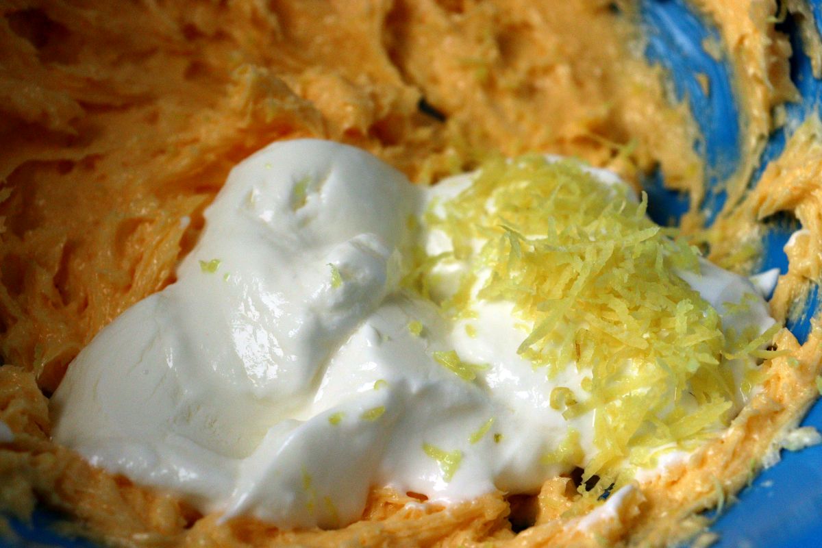 Soft butter mixed with sugar and egg yolks, with added yogurt and lemon peel