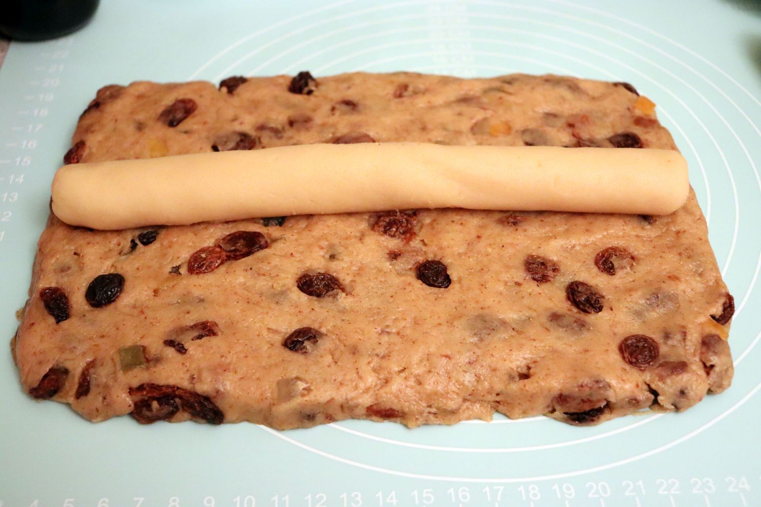 Dresdner Stollen with marzipan, ready to be rolled