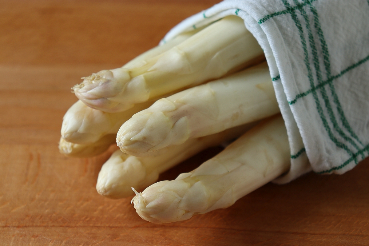 Store Asparagus in a damp towel, in the vegetable compartment of the fridge