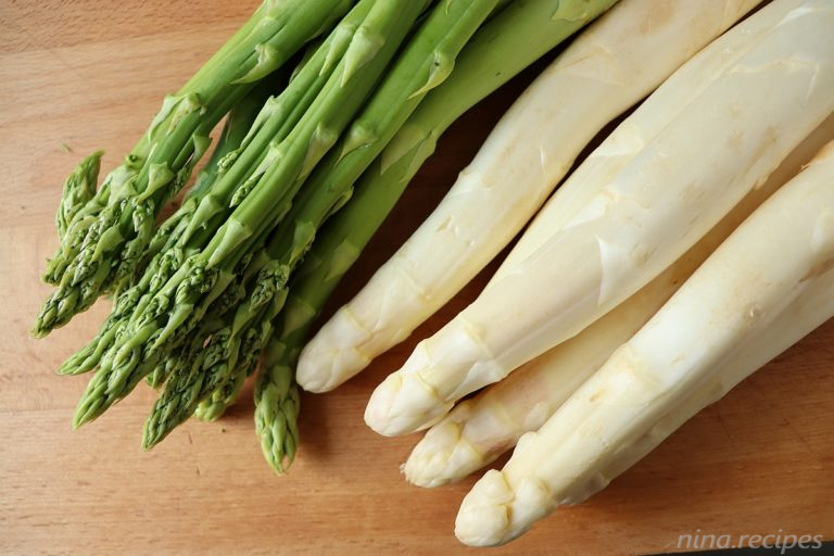 Nina Recipes: Varieties of Asparagus: white Asparagus and green Asparagus on a wooden copping board