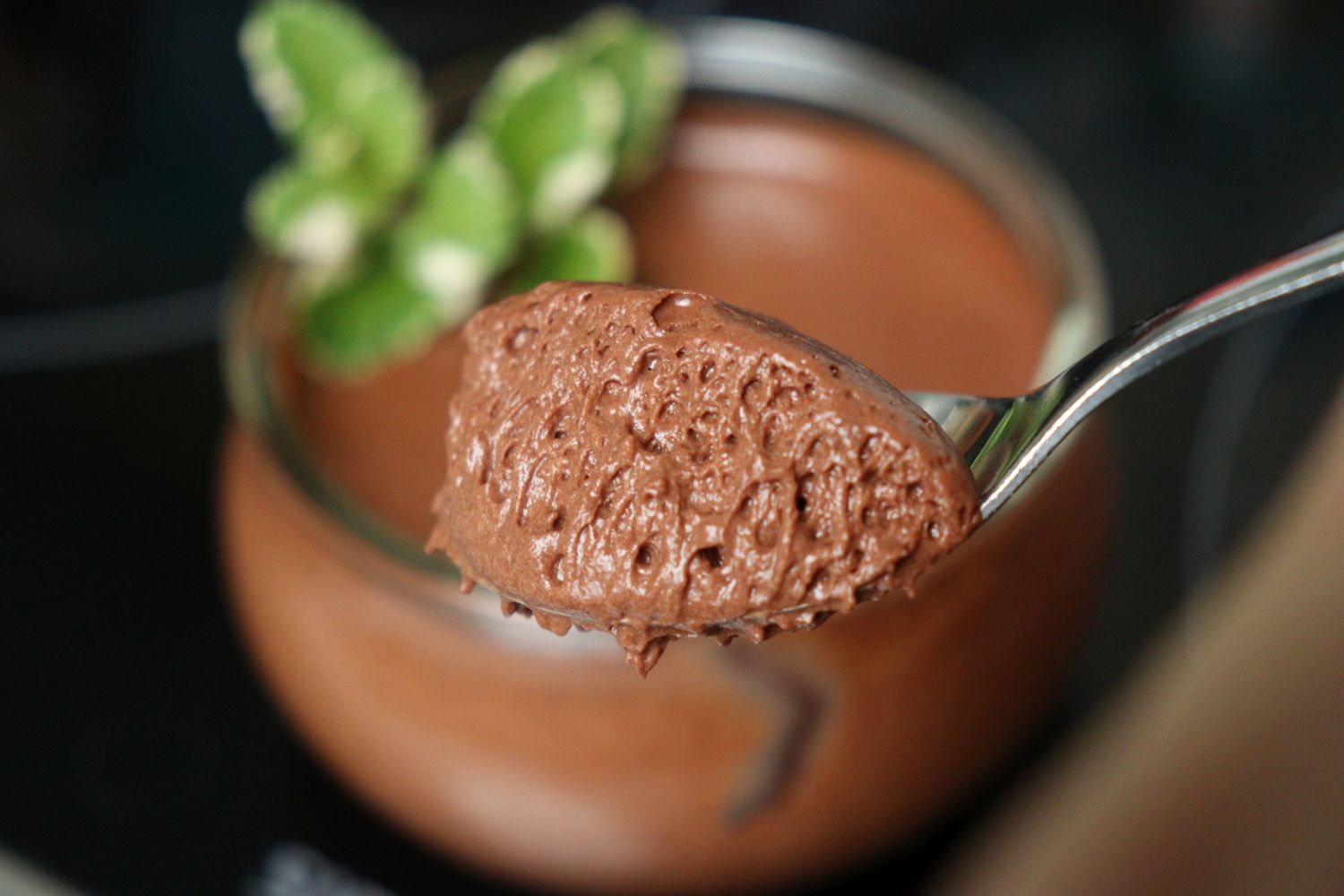 Nina Recipes - Chocolate Mousse (Mousse au chocolat): a spoonful of airy chocolate mousse served with fresh mint leaves