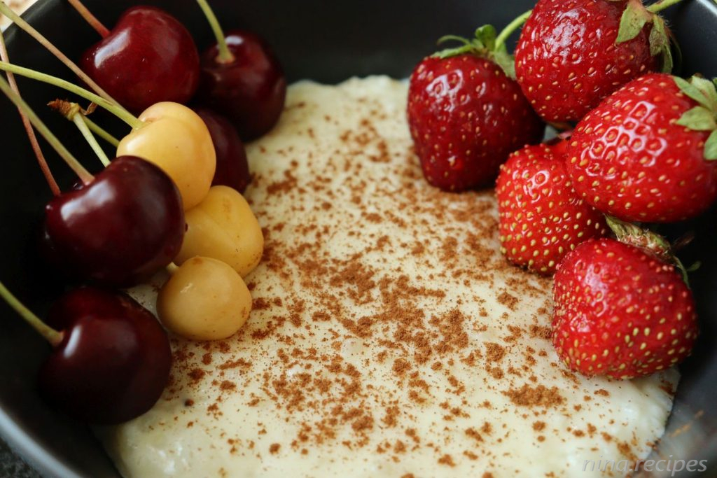 Nina's Recipes: Milchreis (Milk Rice) - German Rice Pudding topped with cinnamon and seasonal fruits like cherries and strawberries