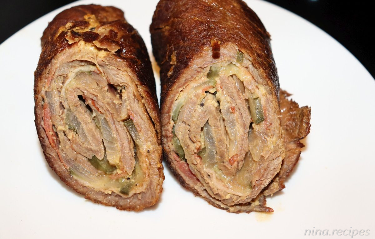 Rinderrouladen - German beef roll-ups filled with bacon, pickled cucumbers and onions